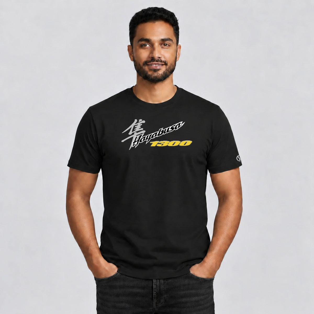 Male model wearing a black Stylingo Hayabusa Yellow motorcycle graphic T-shirt in a casual lifestyle setting.