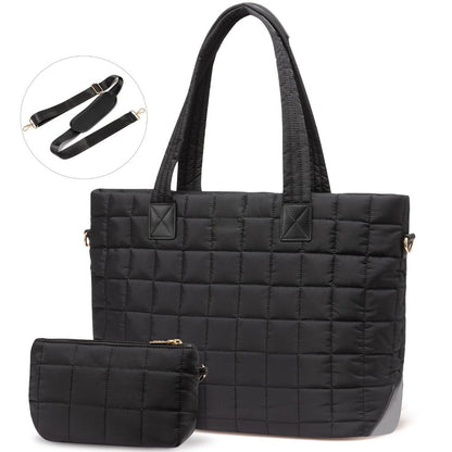 Black Zuri quilted tote bag with adjustable shoulder strap and matching mini pouch.