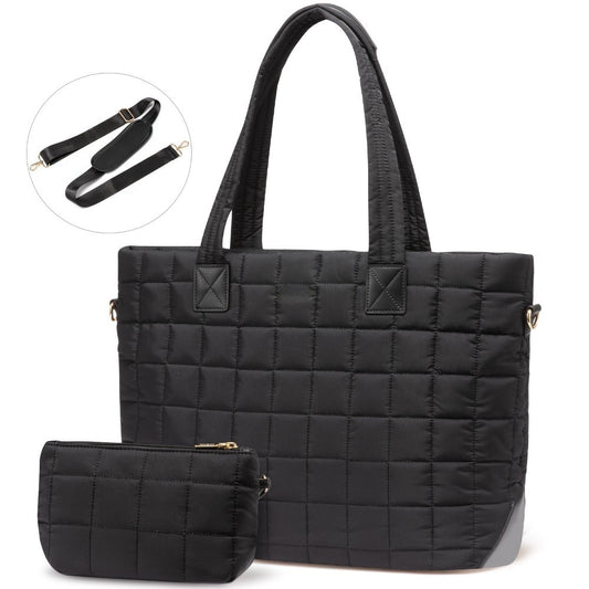 Black Zuri quilted tote bag with adjustable shoulder strap and matching mini pouch.