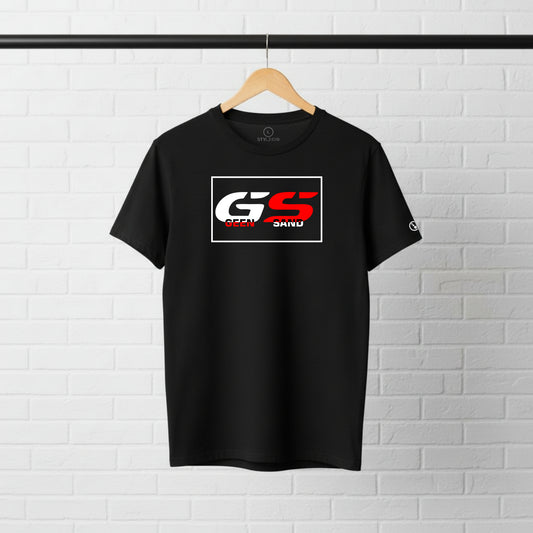 Black Stylingo GS - Geen Sand motorcycle T-shirt featuring an adventure motorcycle graphic design on the chest.
