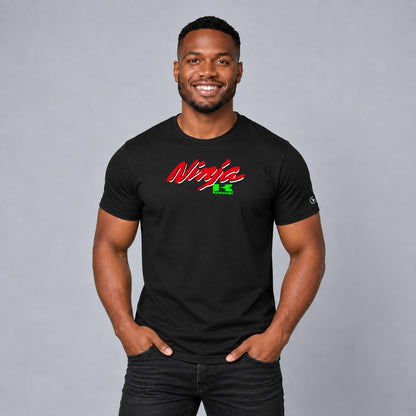 Male model wearing a black Stylingo Kawasaki Ninja motorcycle graphic T-shirt in a casual lifestyle setting.